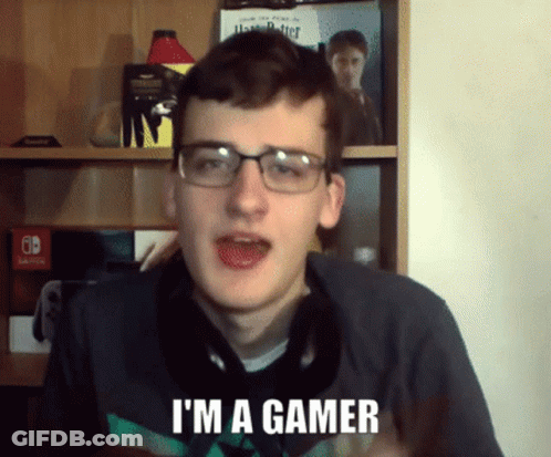 Man With Glasses Says I'm A Gamer With Harry Potter Books GIF
