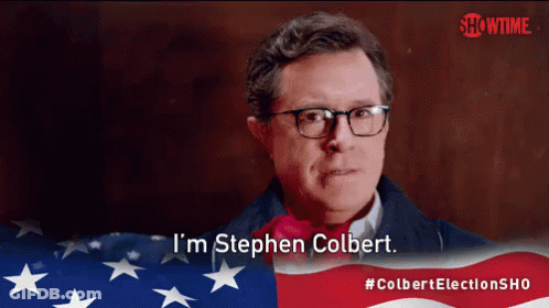 Man With Glasses Says I'm Stephen Colbert Showtime Flag GIF