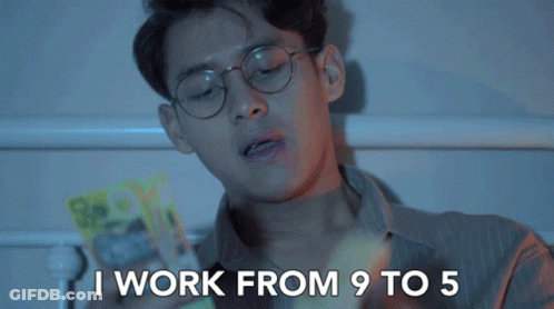 Man With Glasses Says I Work 9 To 5 Holding Box GIF