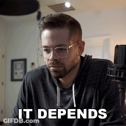 Man With Glasses Says It Depends GIF