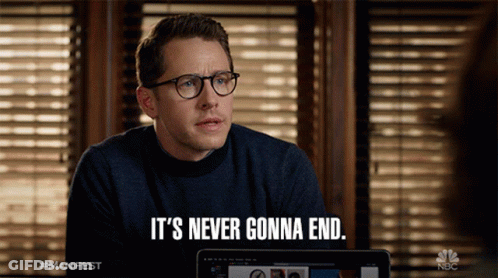 Man With Glasses Says It's Never Gonna End At Laptop GIF