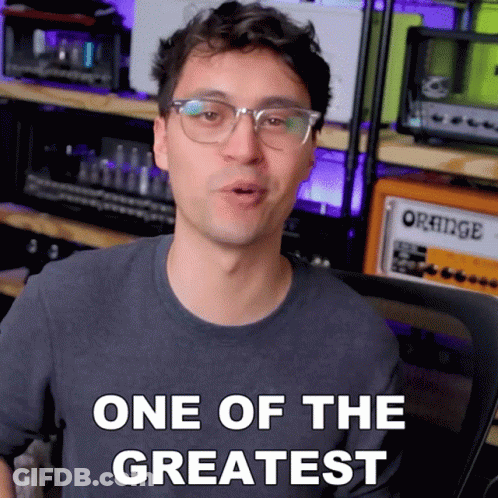 Man With Glasses Says One Of The Greatest In Front Of Orange Amplifier GIF