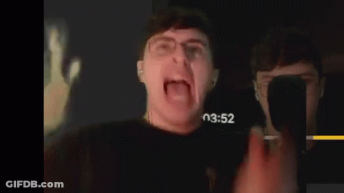 Man With Glasses Screaming In Dark Room GIF