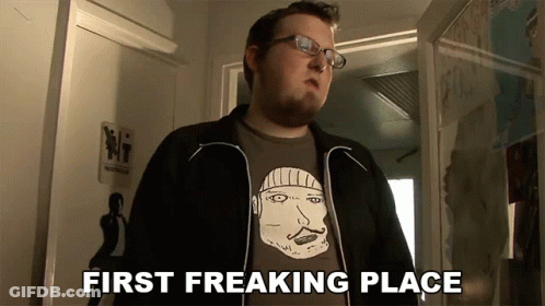 Man With Glasses Shirt Saying First Freaking Place GIF