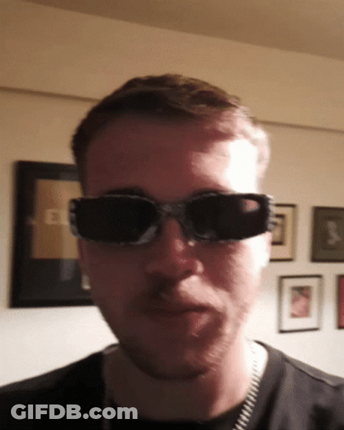 Man With Glasses Showing Short Mullet GIF