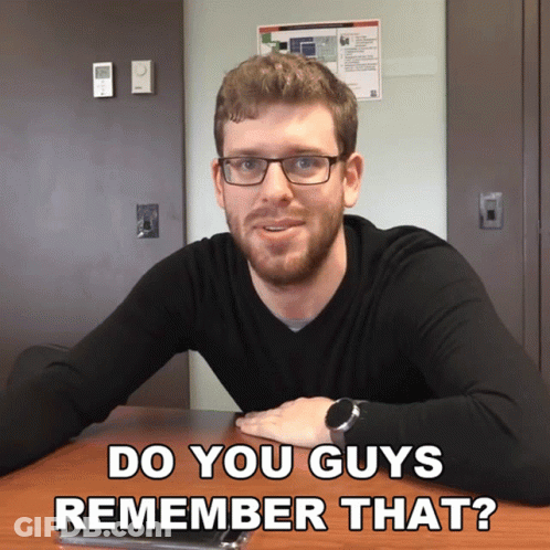 Man With Glasses Sits At Table Saying Do You Guys Remember That GIF