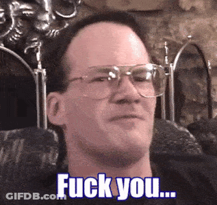 Man With Glasses Sitting In Chair Saying Fuck You GIF