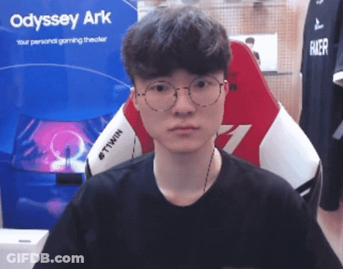Man With Glasses Sitting In Front Of Odyssey Ark Sign GIF
