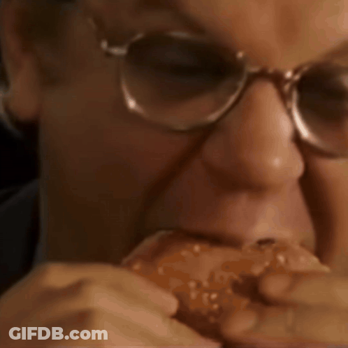 Man With Glasses Slight Smirk GIF