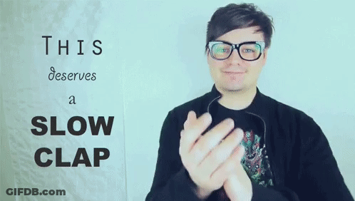 Man With Glasses Slow Clap GIF