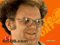 Man With Glasses Smiling In Front Of Orange Background Number 5 GIF