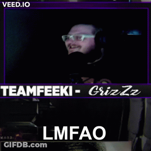 Man With Glasses Smiling In Front Of Teamfeeki Grizz Screen GIF