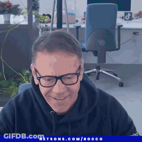 Man With Glasses Smiling Netsons.com Rocco Ad GIF