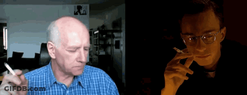 Man With Glasses Smoking Cigarette GIF
