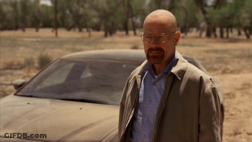 Man With Glasses Standing In Front Of Car GIF