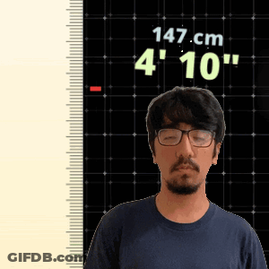 Man With Glasses Standing In Front Of Ruler Reading 147 Cm GIF