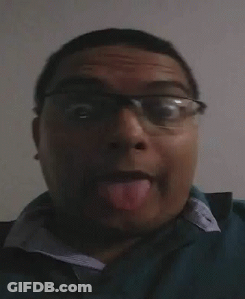 Man With Glasses Sticking Tongue Out GIF