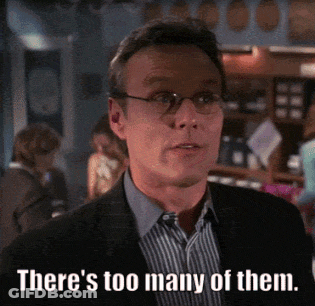 Man With Glasses Suit Saying Too Many Of Them GIF