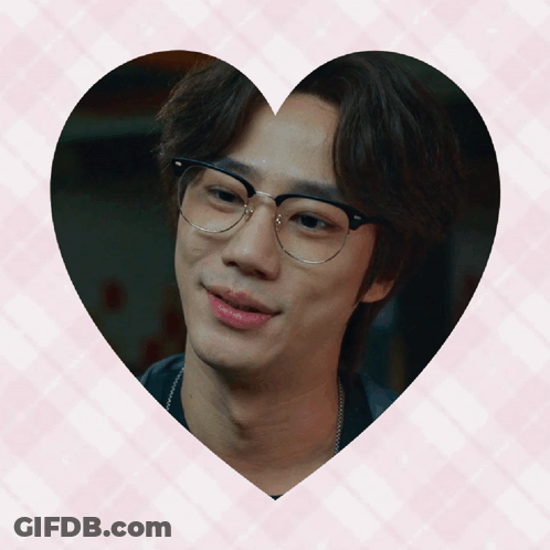 Man With Glasses Surrounded By Heart GIF