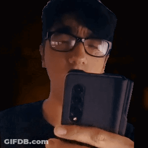 Man With Glasses Taking Selfie GIF