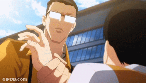 Man With Glasses Talking To Man In Front Of Building GIF