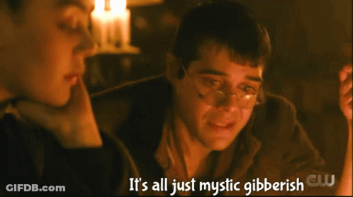 Man With Glasses Talks To Woman Saying It's All Just Mystic Gibberish GIF
