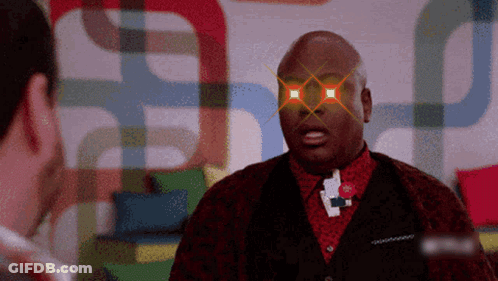 Man With Glowing Eyes Talking Letter P Wall GIF