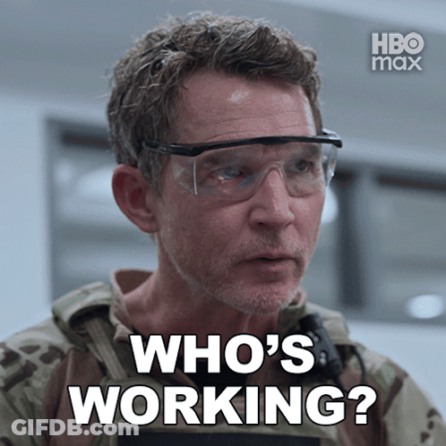 Man With Goggles Saying Who's Working On Screen GIF