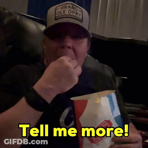 Man With Grand Ole Opry Hat Eating Popcorn GIF