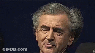 Man With Gray Hair Against Dark Blue Background GIF