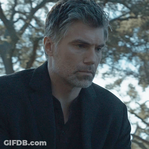 Man With Gray Hair And Beard In Black Jacket GIF