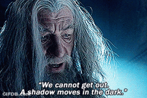 Man With Gray Hair And Beard Says We Cannot Get Out A Shadow Moves In The Dark GIF
