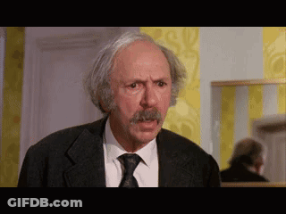 Man With Gray Hair And Mustache In Suit GIF