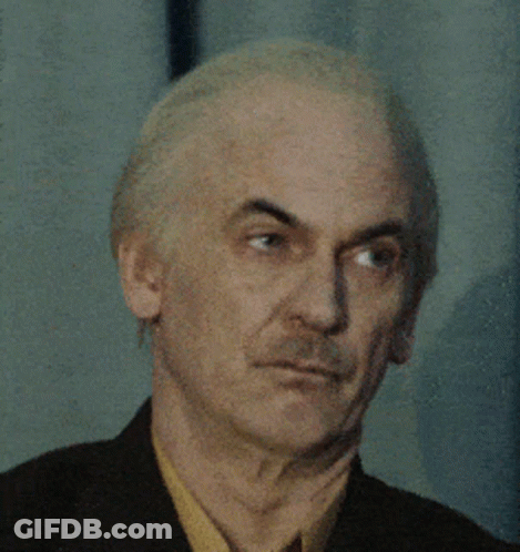 Man With Gray Hair In Black Suit GIF