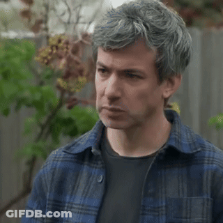 Man With Gray Hair In Blue Plaid And Black Shirt GIF
