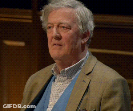 Man With Gray Hair In Plaid Jacket GIF