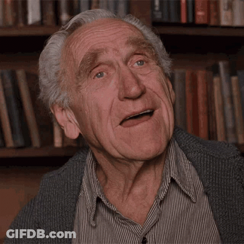 Man With Gray Hair Making Funny Face GIF
