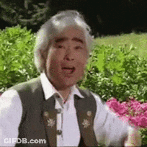 Man With Gray Hair Making Funny Face GIF