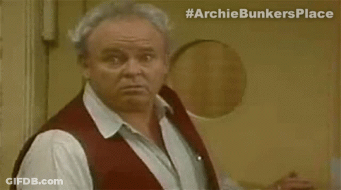 Man With Gray Hair Standing In Doorway GIF
