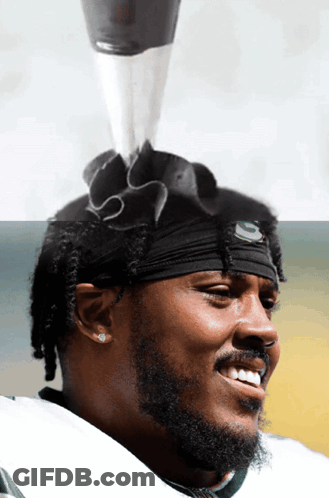 Man With Green Bay Packers Headband GIF