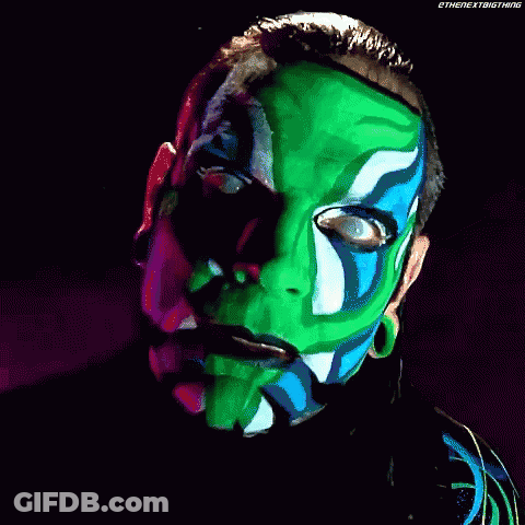 Man With Green Blue And White Paint On Face GIF