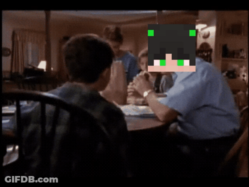 Man With Green Eyes Sits At Table With Children GIF
