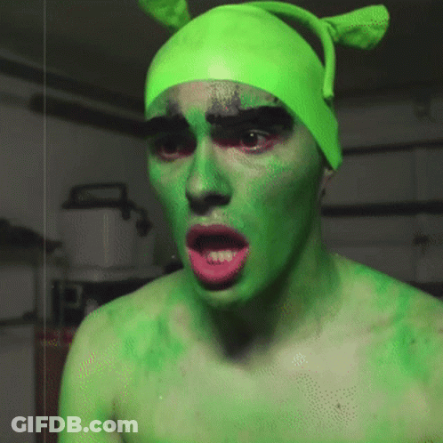 Man With Green Face Paint And Hat GIF