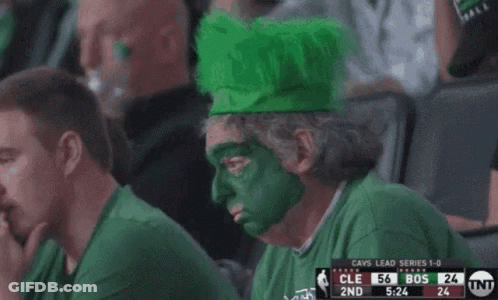 Man With Green Face Paint Watching Game GIF