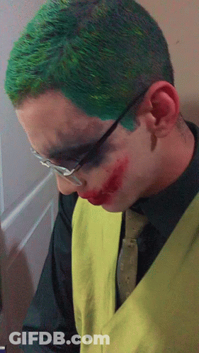 Man With Green Hair And Red Lipstick As Joker GIF