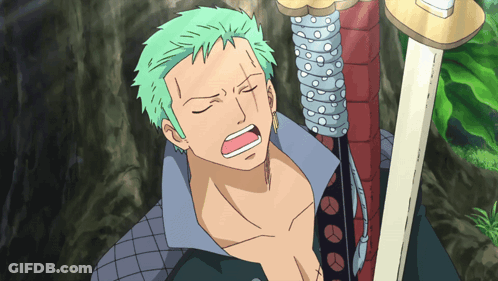 Man With Green Hair Holding Sword With Eyes Closed GIF