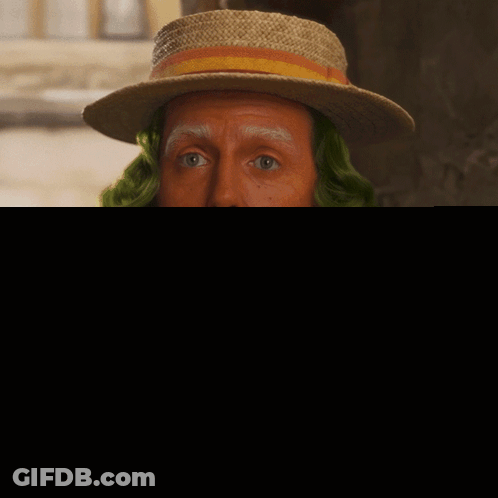 Man With Green Hair Straw Hat Saying Im Not Going Anywhere GIF