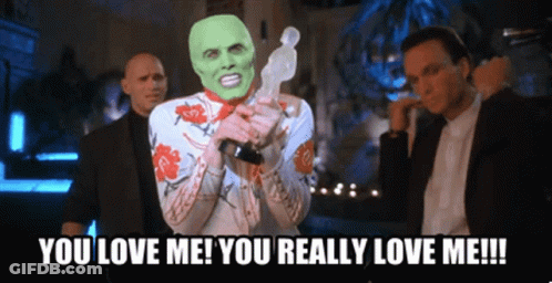 Man With Green Mask Holding Trophy Saying You Love Me You Really Love Me!!! GIF