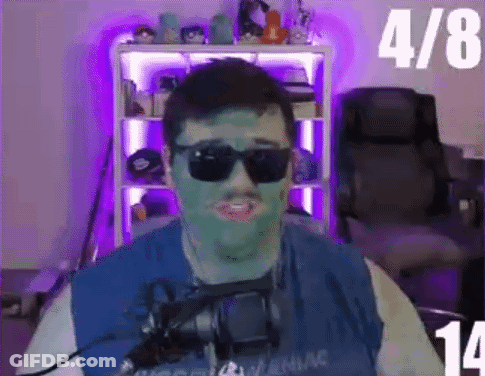 Man With Green Mask Sunglasses And Microphone GIF