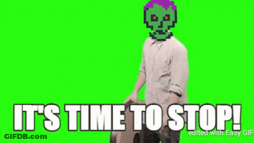 Man With Green Skull Holding Wheel Says Stop GIF